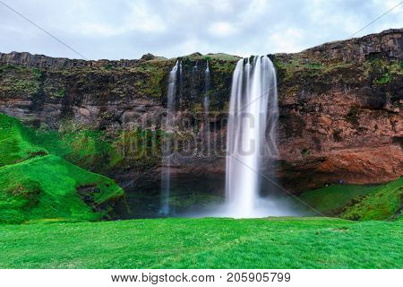 Sunrise on Seljalandfoss waterfall
