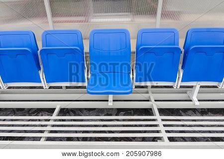 Detail of Reserve chair and staff coach bench in sport stadium