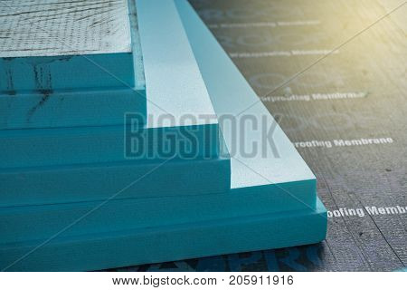 XPS polystyrene insulation boards closeup stacked on the floor