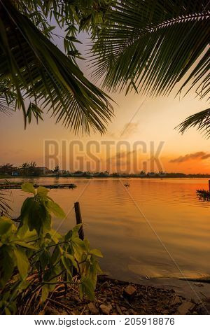 Vinh Cura Dai river in Hoi An Vietnam at sunset