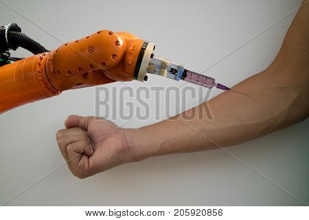 smart robotic in medical concept doctor robot try to inject the medicine on upper arm of the patient it help to faster recovery timeprecising area less cosmetic damage and lower overall costs