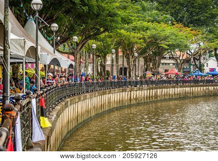 Sarawak Kuching Water Festival in november 2016, where competitors in the regatta are rowing longboats.