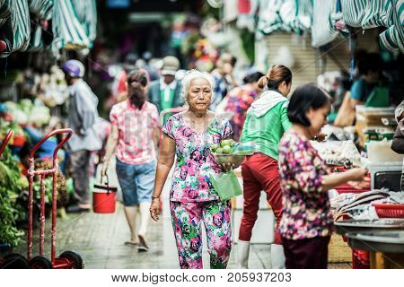 HO CHI MINH CITY (SAIGON), VIETNAM - JULY 2017 : Unidentified vendrs at Ben Thanh market in Saigon, Ho Chi Minh City, Vietnam