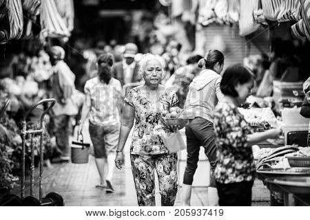 HO CHI MINH CITY (SAIGON), VIETNAM - JULY 2017 : Unidentified vendrs at Ben Thanh market in Saigon, Ho Chi Minh City, Vietnam