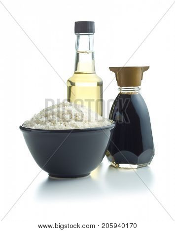 Sushi rice, soy sauce and vinegar isolated on white background.