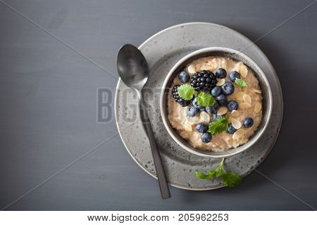 healthy breakfast steel cut oatmeal porridge with blueberry blackberry