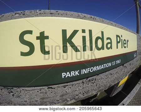 St Kilda, Australia: December 01, 2015: Parks department information sign at the entrance to the iconic St Kilda's pier.