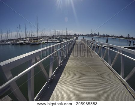 St Kilda, Australia: January 12, 2015: Wide angle image of the marina at St Kilda, Melbourne with an amazing view of Melbourne city skyline.