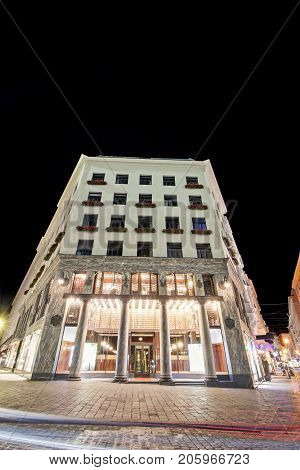 Low angle view of historic illuminated building at night at Vienna, Austria