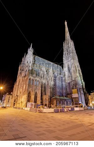 Low angle view of illuminated Saint Stephen's Cathedral during night at Vienna, Austria