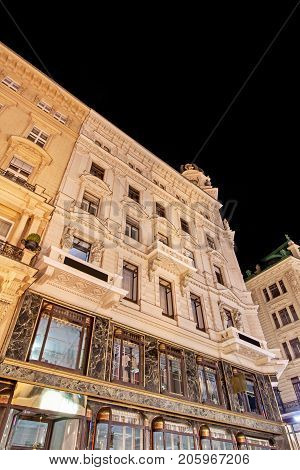 Low angle view of historic illuminated building at night at Vienna, Austria