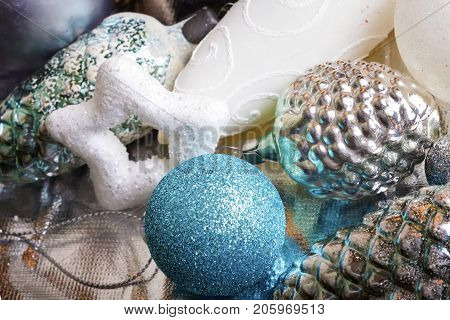 New year silver and blue decoration on briliance background. Top view