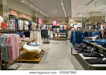 SAINT PETERSBURG, RUSSIA - CIRCA AUGUST, 2017: inside Koton store at Galeria shopping center. Galeria is major shopping and entertainment center is located in downtown of St. Petersburg