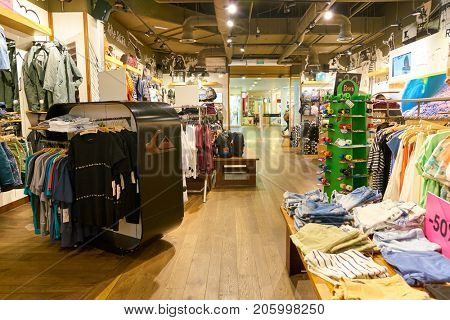 SAINT PETERSBURG, RUSSIA - CIRCA AUGUST, 2017: inside Quiksilver store at Galeria shopping center. Quiksilver, Inc. is an American retail sporting company.