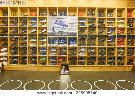SAINT PETERSBURG, RUSSIA - CIRCA AUGUST, 2017: inside Reebok store at Galeria shopping center. Reebok is a global athletic footwear and apparel company.