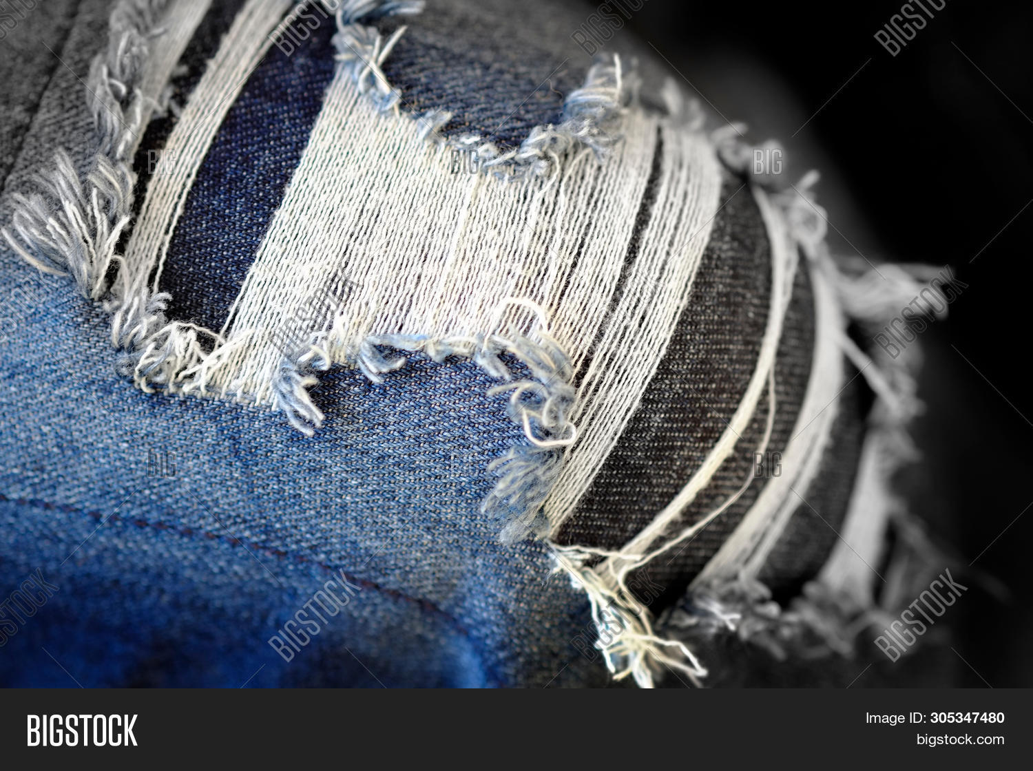 frayed blue jeans