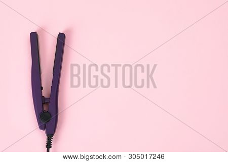 Modern Hair Iron For Straightening On Color Background, Top View With Space For Text