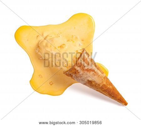 Top View Mango Flavor Ice Cream Cone In A Melting Process On White With Clipping Path