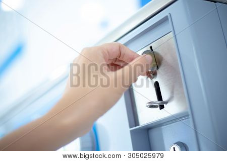 Coin Slot Of Coin Laundry Vending Machine, Coin Inserting By Hand