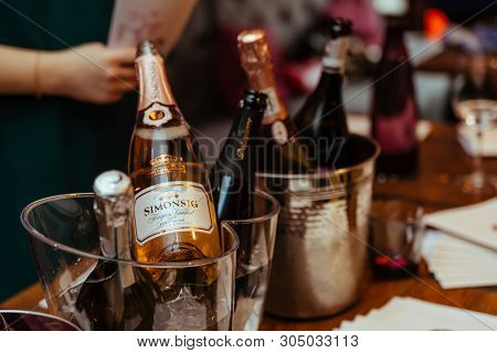 Moscow, Russia-march 30, 2019: Wine Tasting: On A Wooden Table There Are Silver Buckets For Cooling 