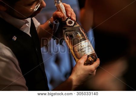 Moscow, Russia-march 30, 2019: Wine Tasting: The Sommelier Offers To Tasting The Wine From The Bottl
