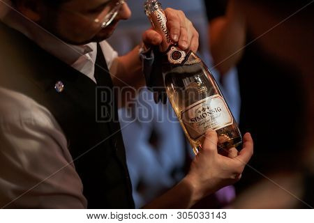 Moscow, Russia-march 30, 2019: Wine Tasting: The Sommelier Offers To Tasting The Wine From The Bottl
