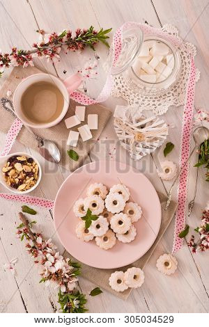 Canestrelli Biscuits With Icing Sugar On Wooden Table.