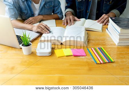 Woman And Man Work On The Table