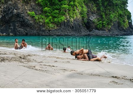 Bali, Indonesia - January 14, 2018: Kids Playing At Tropical Beach In Bali Near Chandidasa, Knowen A