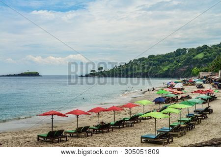Bali, Indonesia - January 14, 2018: Peoples Relaxing At Tropical Beach In Bali Near Chandidasa, Know