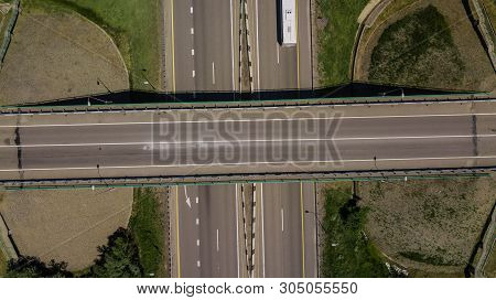 Top Down View Of Highway Intersection Car Bridge And Moving Cars