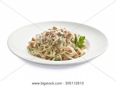 Pasta Carbonara With Parsley On A Plate On A White Background