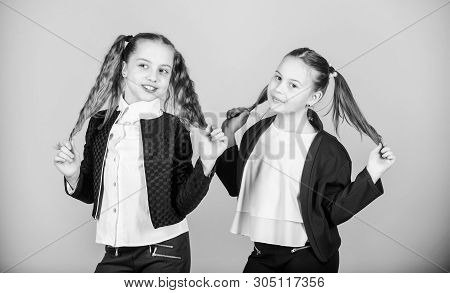 Hairstyle For Female. Cheerful Friends Made Same Hairstyle For Fun. We Look Like Sisters. Best Frien