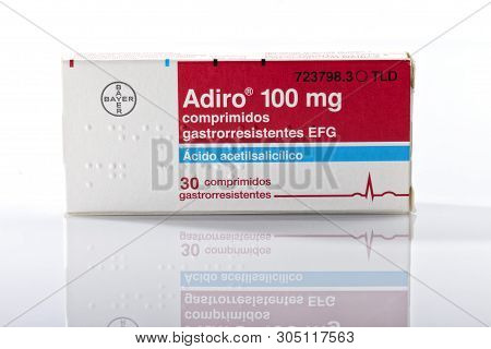 A Box Of Acetylsalicylic Acid Adiro Tablets Of The Bayer Brand Isolated On White. Infantile Aspirin.
