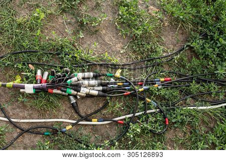 Connectors For Music And Microphone For A Festive Party. Wires With Connectors Xlr Lie On The Ground