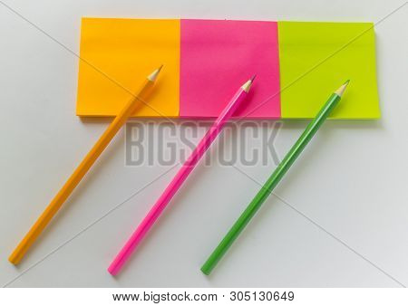 Multicolored Pencils Are About Multicolored Stickers. Office Tools.
