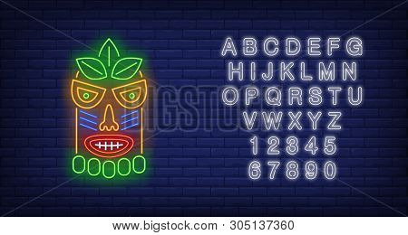 Bright Tribal Mask Neon Sign. Tiki Idol, Ancient Culture Design. Night Bright Neon Sign, Colorful Bi