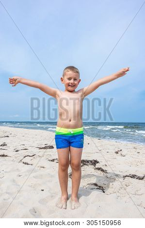 Boy On The Beach