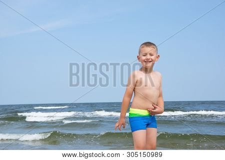 Boy On The Beach