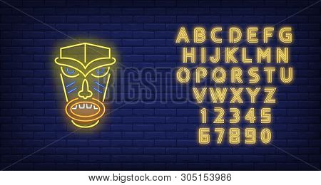 Angry Tiki Idol Neon Sign. Tribal Mask, Ancient Culture Design. Night Bright Neon Sign, Colorful Bil