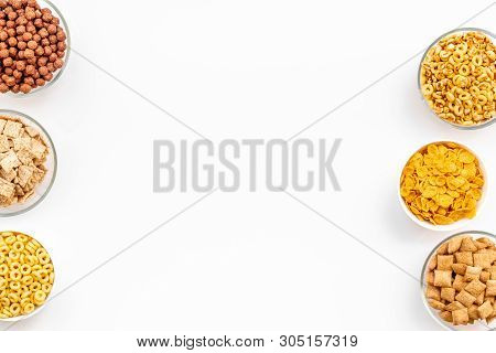Cereals, Oatflakes And Cornflakes For Healthy Breakfast On White Background Top View Mock Up