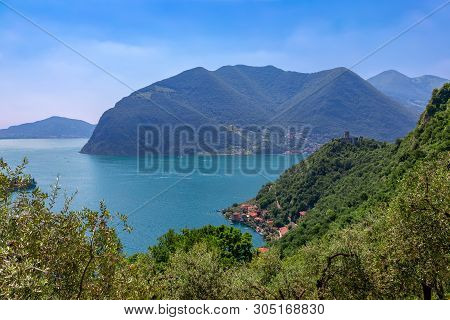 Iseo Lake, Brescia, Italy - June 02, 2019: Beautiful View Of Lake Iseo With A Small Old Town On The 