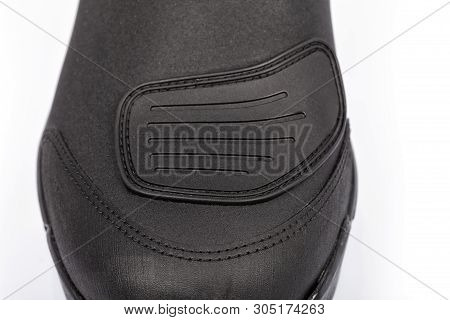 Detail Of The Reinforcement For The Gear Lever Of A Motorcycle Boot Isolated On White.