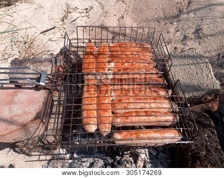 Kupaty Chicken Fried On A Fire. Barbecue From Kupaty.