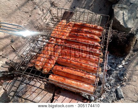 Kupaty Chicken Fried On A Fire. Barbecue From Kupaty.