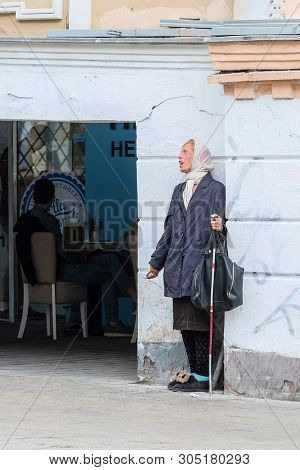 Moscow, Russia - June, 3, 2019: blind woman beggar begs on Moscow street, Russia