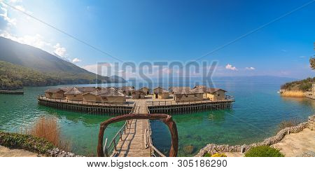 Panoramic View Of The Wooden Pier Leading To The Bay Of The Bones Museum On Water, Authentic Reconst