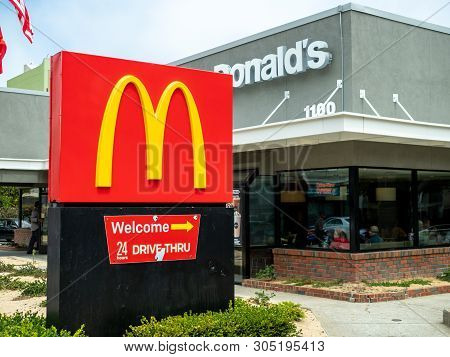 San Francisco, Ca July 29, 2018: Mcdonalds Logo, Restaurant Location And 24 Hour Drive Through Sign 