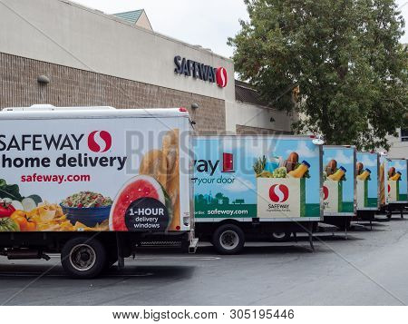 San Francisco, Ca July 29, 2018: Fleet Of Safeway Home Grocery Delivery Trucks Outside Of Store Loca