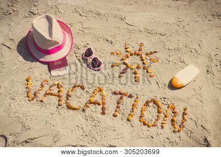 Inscription Vacation Made Of Amber Stones, Accessoriess For Sunbathing And Passport With Currencies 